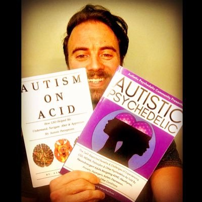 Aaron Paul Orsini with his book, Autism on Acid. 