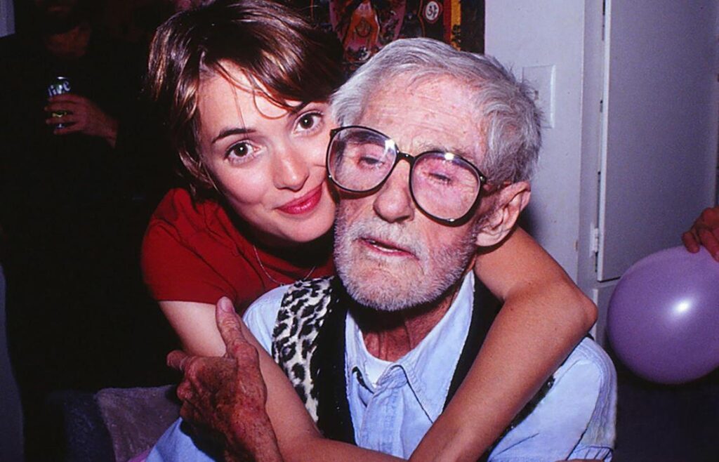 Winona Ryder hugging Timothy Leary